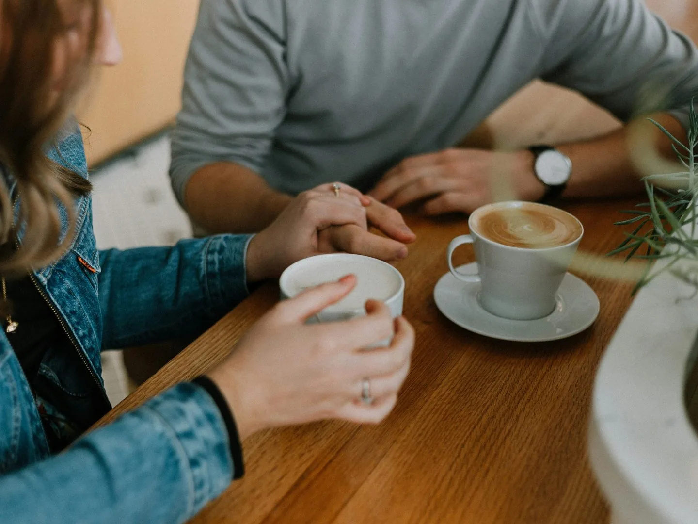 A couple sharing coffee and conversation